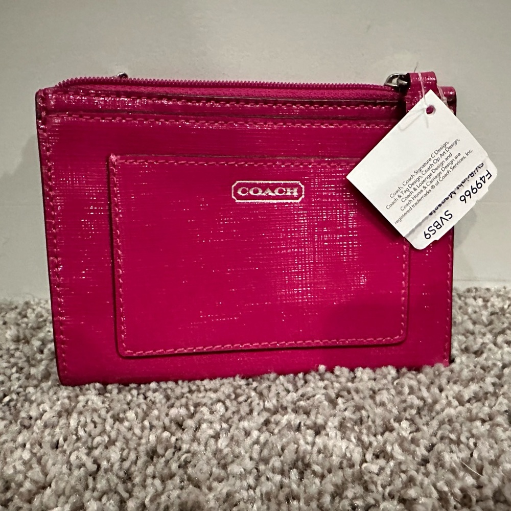 Coach zipper wallet. Two front pockets and main zipper pocket